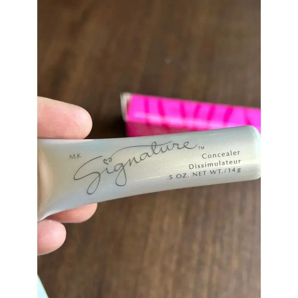 Mary Kay Signature Concealer tube in a 0.5 oz yellow